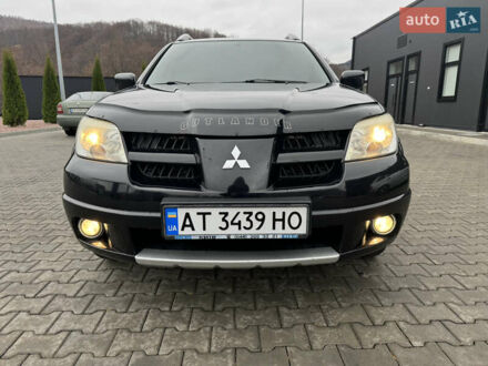 Мицубиси Аутлендер 2009 в Ивано-Франковске на Automoto.ua Черный Мицубиси Аутлендер, объемом двигателя 2 л и пробегом 171 тыс. км за 6999 $, фото 1 на Automoto.ua