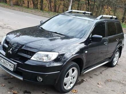 Мицубиси Аутлендер 2009 в Львове на Automoto.ua Черный Мицубиси Аутлендер, объемом двигателя 2 л и пробегом 160 тыс. км за 8500 $, фото 1 на Automoto.ua