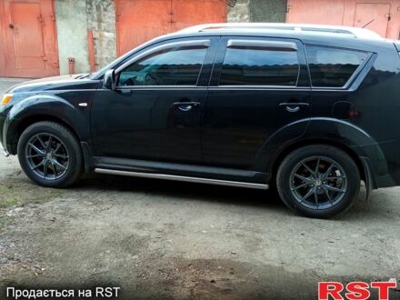 Міцубісі Аутлендер 2009 у Донецьку на Automoto.ua Чорний Міцубісі Аутлендер, об'ємом двигуна 24 л та пробігом 145 тис. км за 8900 $, фото 1 на Automoto.ua