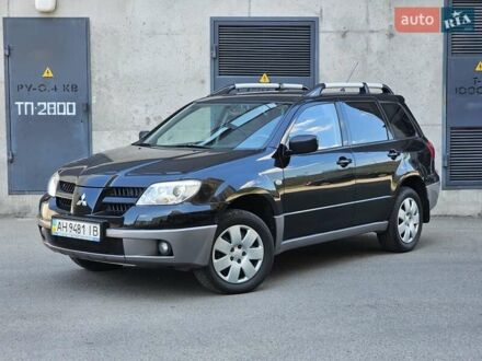 Мицубиси Аутлендер 2009 в Киеве на Automoto.ua Черный Мицубиси Аутлендер, объемом двигателя 2 л и пробегом 214 тыс. км за 7000 $, фото 1 на Automoto.ua