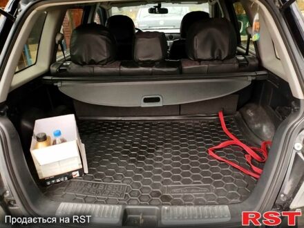 Черный Мицубиси Аутлендер, объемом двигателя 2 л и пробегом 280 тыс. км за 5800 $, фото 1 на Automoto.ua