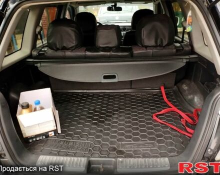 Черный Мицубиси Аутлендер, объемом двигателя 2 л и пробегом 280 тыс. км за 5800 $, фото 1 на Automoto.ua