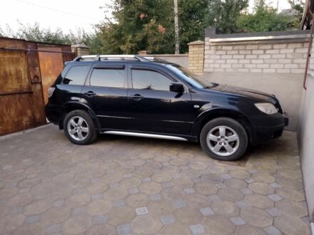 Мицубиси Аутлендер 2009 в Запорожье на Automoto.ua Черный Мицубиси Аутлендер, объемом двигателя 2 л и пробегом 198 тыс. км за 6200 $, фото 1 на Automoto.ua
