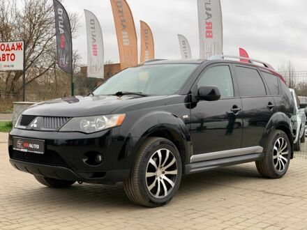 Черный Мицубиси Аутлендер, объемом двигателя 2.4 л и пробегом 175 тыс. км за 10499 $, фото 1 на Automoto.ua