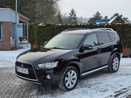 Черный Мицубиси Аутлендер, объемом двигателя 2 л и пробегом 212 тыс. км за 3000 $, фото 1 на Automoto.ua