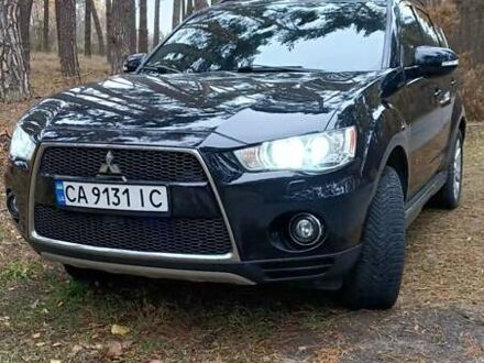 Черный Мицубиси Аутлендер, объемом двигателя 2.2 л и пробегом 267 тыс. км за 9999 $, фото 1 на Automoto.ua