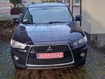Міцубісі Аутлендер 2010 у Рівному на Automoto.ua Чорний Міцубісі Аутлендер, об'ємом двигуна 2 л та пробігом 248 тис. км за 9700 $, фото 1 на Automoto.ua