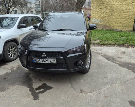 Чорний Міцубісі Аутлендер, об'ємом двигуна 2.4 л та пробігом 198 тис. км за 10500 $, фото 1 на Automoto.ua