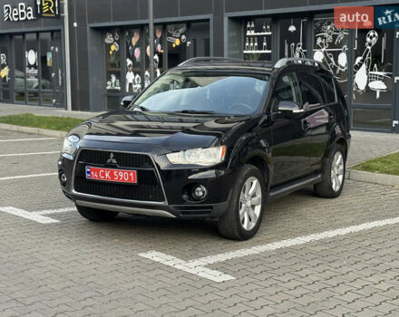 Чорний Міцубісі Аутлендер, об'ємом двигуна 2.2 л та пробігом 225 тис. км за 10950 $, фото 1 на Automoto.ua