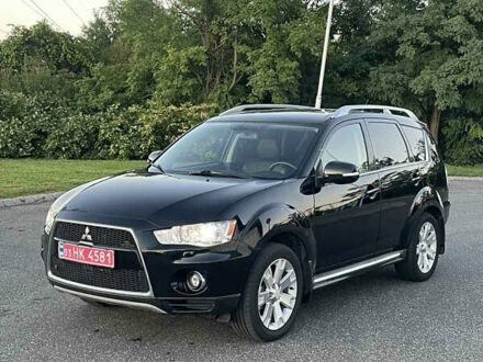 Черный Мицубиси Аутлендер, объемом двигателя 0 л и пробегом 257 тыс. км за 10399 $, фото 1 на Automoto.ua