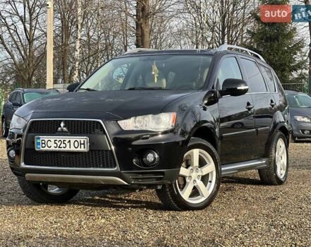 Черный Мицубиси Аутлендер, объемом двигателя 2.18 л и пробегом 249 тыс. км за 11500 $, фото 1 на Automoto.ua