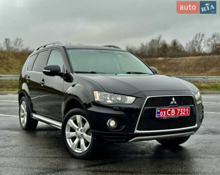 Чорний Міцубісі Аутлендер, об'ємом двигуна 2 л та пробігом 228 тис. км за 10550 $, фото 1 на Automoto.ua