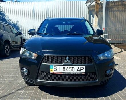Черный Мицубиси Аутлендер, объемом двигателя 2 л и пробегом 291 тыс. км за 11200 $, фото 1 на Automoto.ua
