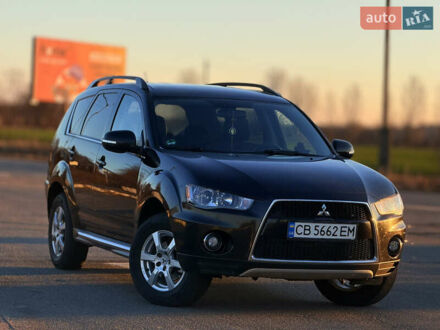 Черный Мицубиси Аутлендер, объемом двигателя 2.27 л и пробегом 240 тыс. км за 9600 $, фото 1 на Automoto.ua