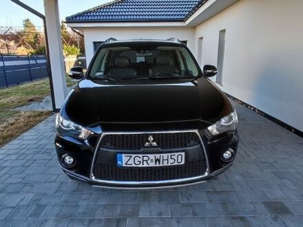 Черный Мицубиси Аутлендер, объемом двигателя 2 л и пробегом 264 тыс. км за 2900 $, фото 1 на Automoto.ua