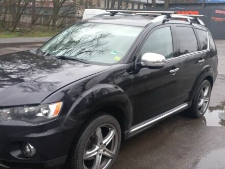 Черный Мицубиси Аутлендер, объемом двигателя 2.2 л и пробегом 363 тыс. км за 4600 $, фото 1 на Automoto.ua