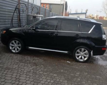 Черный Мицубиси Аутлендер, объемом двигателя 2.2 л и пробегом 264 тыс. км за 10700 $, фото 1 на Automoto.ua
