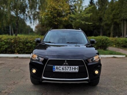 Чорний Міцубісі Аутлендер, об'ємом двигуна 2.3 л та пробігом 245 тис. км за 10150 $, фото 1 на Automoto.ua