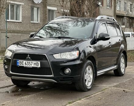 Чорний Міцубісі Аутлендер, об'ємом двигуна 2.4 л та пробігом 197 тис. км за 11300 $, фото 1 на Automoto.ua