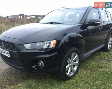 Чорний Міцубісі Аутлендер, об'ємом двигуна 2.36 л та пробігом 315 тис. км за 9700 $, фото 1 на Automoto.ua