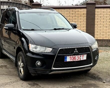 Чорний Міцубісі Аутлендер, об'ємом двигуна 2 л та пробігом 300 тис. км за 5500 $, фото 1 на Automoto.ua