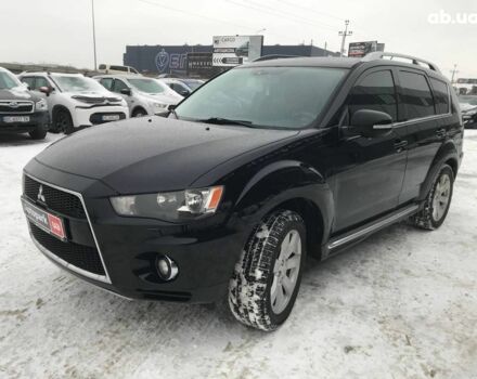 Черный Мицубиси Аутлендер, объемом двигателя 2.2 л и пробегом 260 тыс. км за 11990 $, фото 1 на Automoto.ua