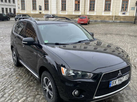 Черный Мицубиси Аутлендер, объемом двигателя 2.27 л и пробегом 233 тыс. км за 10500 $, фото 1 на Automoto.ua