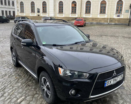 Черный Мицубиси Аутлендер, объемом двигателя 2.27 л и пробегом 233 тыс. км за 10500 $, фото 1 на Automoto.ua