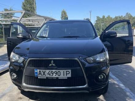 Чорний Міцубісі Аутлендер, об'ємом двигуна 2.4 л та пробігом 97 тис. км за 12700 $, фото 1 на Automoto.ua