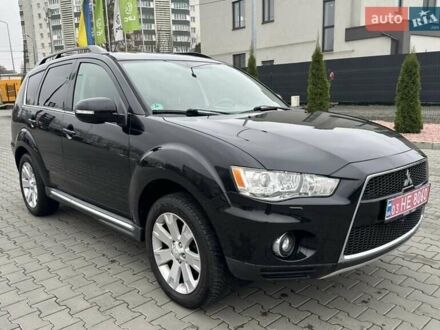 Черный Мицубиси Аутлендер, объемом двигателя 2.2 л и пробегом 226 тыс. км за 10750 $, фото 1 на Automoto.ua