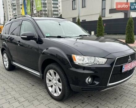Черный Мицубиси Аутлендер, объемом двигателя 2.2 л и пробегом 226 тыс. км за 10750 $, фото 1 на Automoto.ua