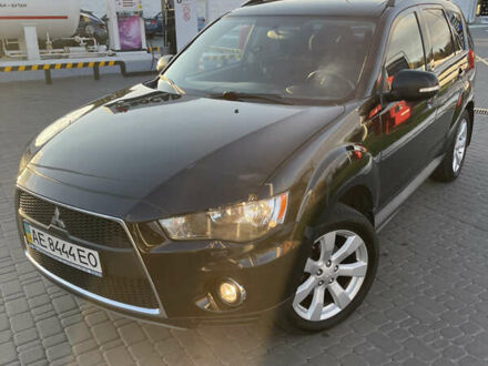 Чорний Міцубісі Аутлендер, об'ємом двигуна 2.4 л та пробігом 93 тис. км за 12500 $, фото 1 на Automoto.ua