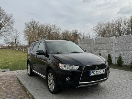 Черный Мицубиси Аутлендер, объемом двигателя 2.3 л и пробегом 170 тыс. км за 8250 $, фото 1 на Automoto.ua