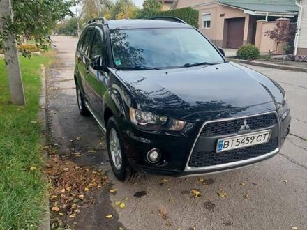 Чорний Міцубісі Аутлендер, об'ємом двигуна 2.3 л та пробігом 271 тис. км за 10500 $, фото 1 на Automoto.ua
