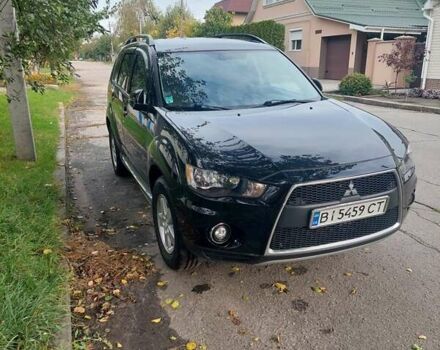 Черный Мицубиси Аутлендер, объемом двигателя 2.3 л и пробегом 271 тыс. км за 10500 $, фото 1 на Automoto.ua