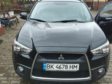 Міцубісі Аутлендер 2012 у Костополе на Automoto.ua Чорний Міцубісі Аутлендер, об'ємом двигуна 1.8 л та пробігом 248 тис. км за 10500 $, фото 1 на Automoto.ua