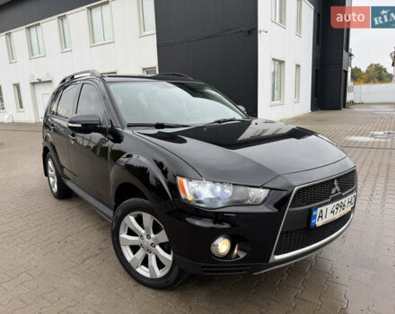 Чорний Міцубісі Аутлендер, об'ємом двигуна 2.36 л та пробігом 96 тис. км за 11700 $, фото 1 на Automoto.ua
