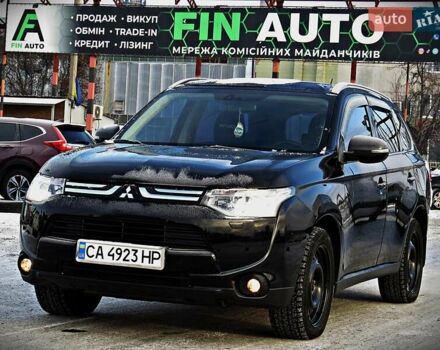 Черный Мицубиси Аутлендер, объемом двигателя 2.36 л и пробегом 124 тыс. км за 12800 $, фото 1 на Automoto.ua