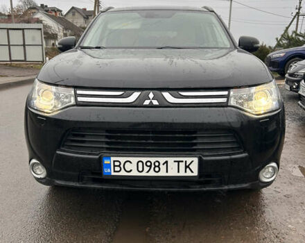 Черный Мицубиси Аутлендер, объемом двигателя 2.27 л и пробегом 202 тыс. км за 13100 $, фото 1 на Automoto.ua