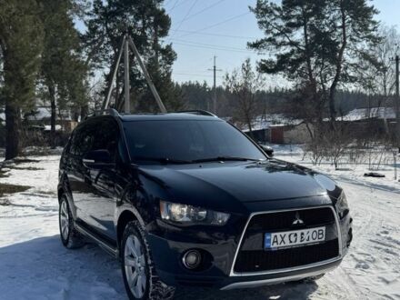 Чорний Міцубісі Аутлендер, об'ємом двигуна 2 л та пробігом 148 тис. км за 7600 $, фото 1 на Automoto.ua
