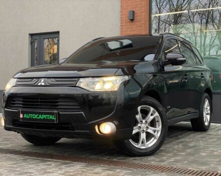 Черный Мицубиси Аутлендер, объемом двигателя 2.4 л и пробегом 212 тыс. км за 12990 $, фото 1 на Automoto.ua