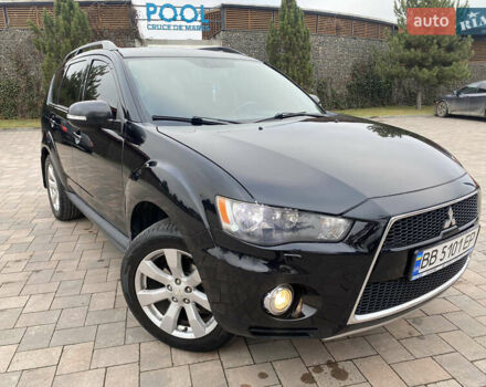 Чорний Міцубісі Аутлендер, об'ємом двигуна 2.4 л та пробігом 242 тис. км за 10000 $, фото 1 на Automoto.ua