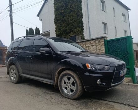 Черный Мицубиси Аутлендер, объемом двигателя 2 л и пробегом 235 тыс. км за 10300 $, фото 1 на Automoto.ua