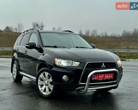 Черный Мицубиси Аутлендер, объемом двигателя 2.2 л и пробегом 215 тыс. км за 11450 $, фото 1 на Automoto.ua