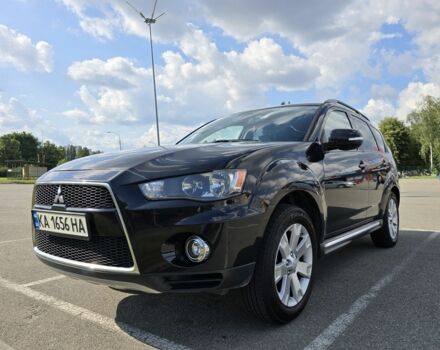 Черный Мицубиси Аутлендер, объемом двигателя 2.4 л и пробегом 261 тыс. км за 10700 $, фото 1 на Automoto.ua