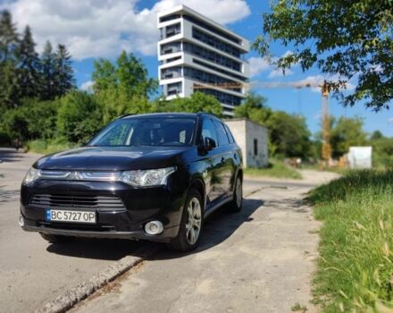 Черный Мицубиси Аутлендер, объемом двигателя 2.3 л и пробегом 225 тыс. км за 13300 $, фото 1 на Automoto.ua