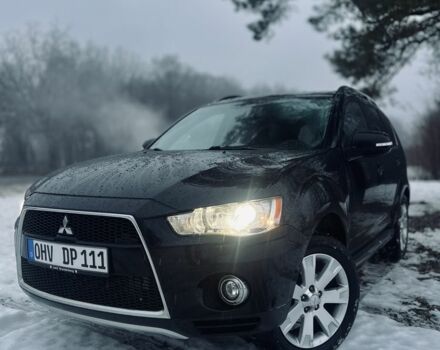 Черный Мицубиси Аутлендер, объемом двигателя 2.2 л и пробегом 290 тыс. км за 6700 $, фото 1 на Automoto.ua
