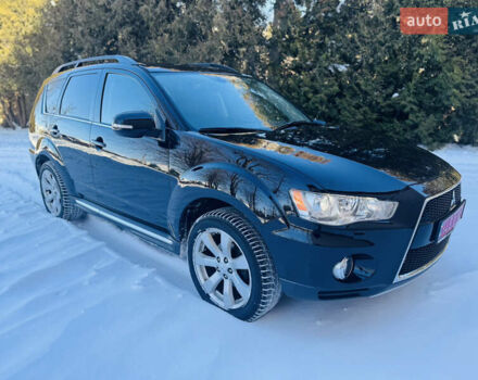 Черный Мицубиси Аутлендер, объемом двигателя 2.2 л и пробегом 113 тыс. км за 12800 $, фото 1 на Automoto.ua