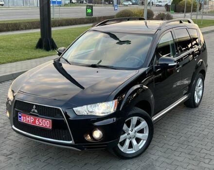 Черный Мицубиси Аутлендер, объемом двигателя 2.3 л и пробегом 124 тыс. км за 11999 $, фото 1 на Automoto.ua