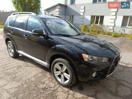 Чорний Міцубісі Аутлендер, об'ємом двигуна 2.2 л та пробігом 218 тис. км за 11800 $, фото 1 на Automoto.ua